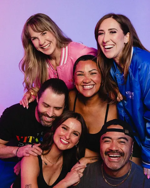 A salon team laughing together