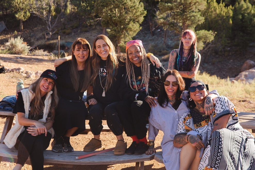 Elizabeth Faye with a group of beauty professionals outdoors
